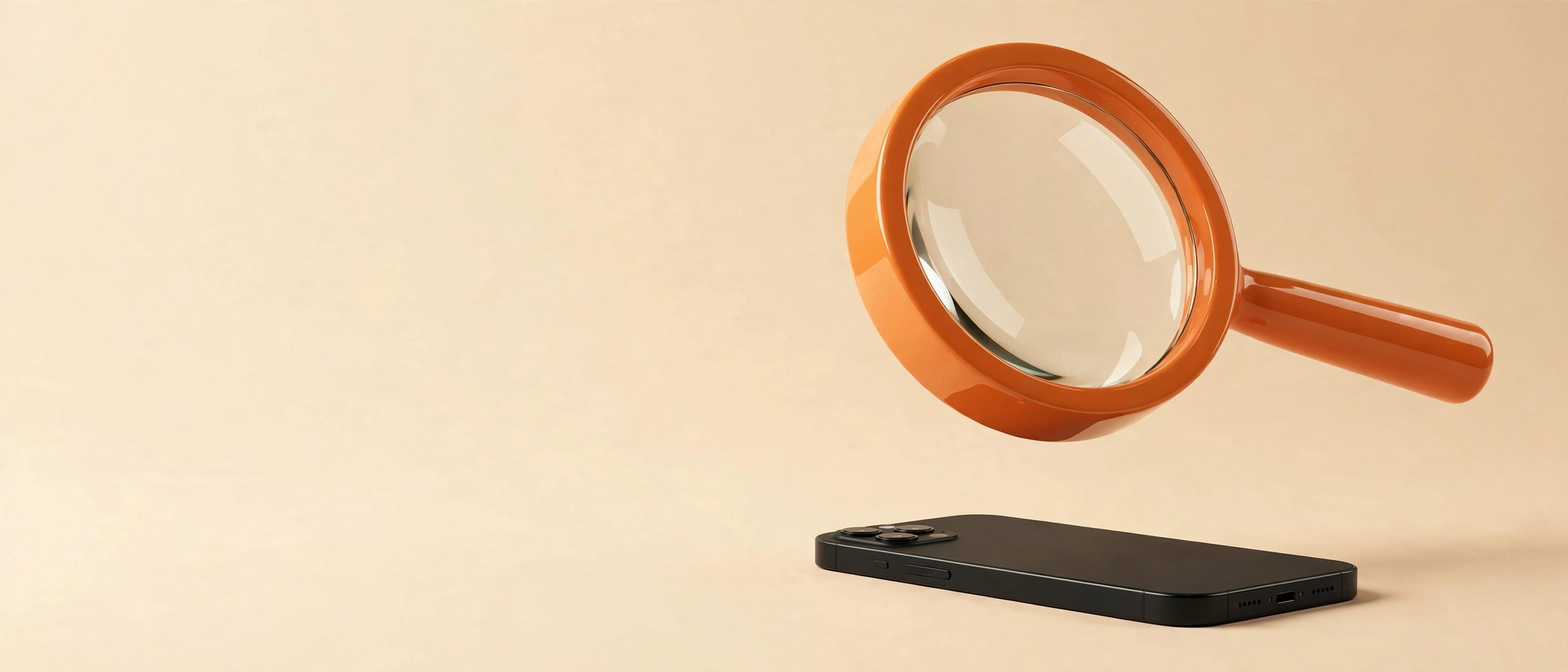 Lupa naranja 3D sobre un teléfono negro sobre fondo crema